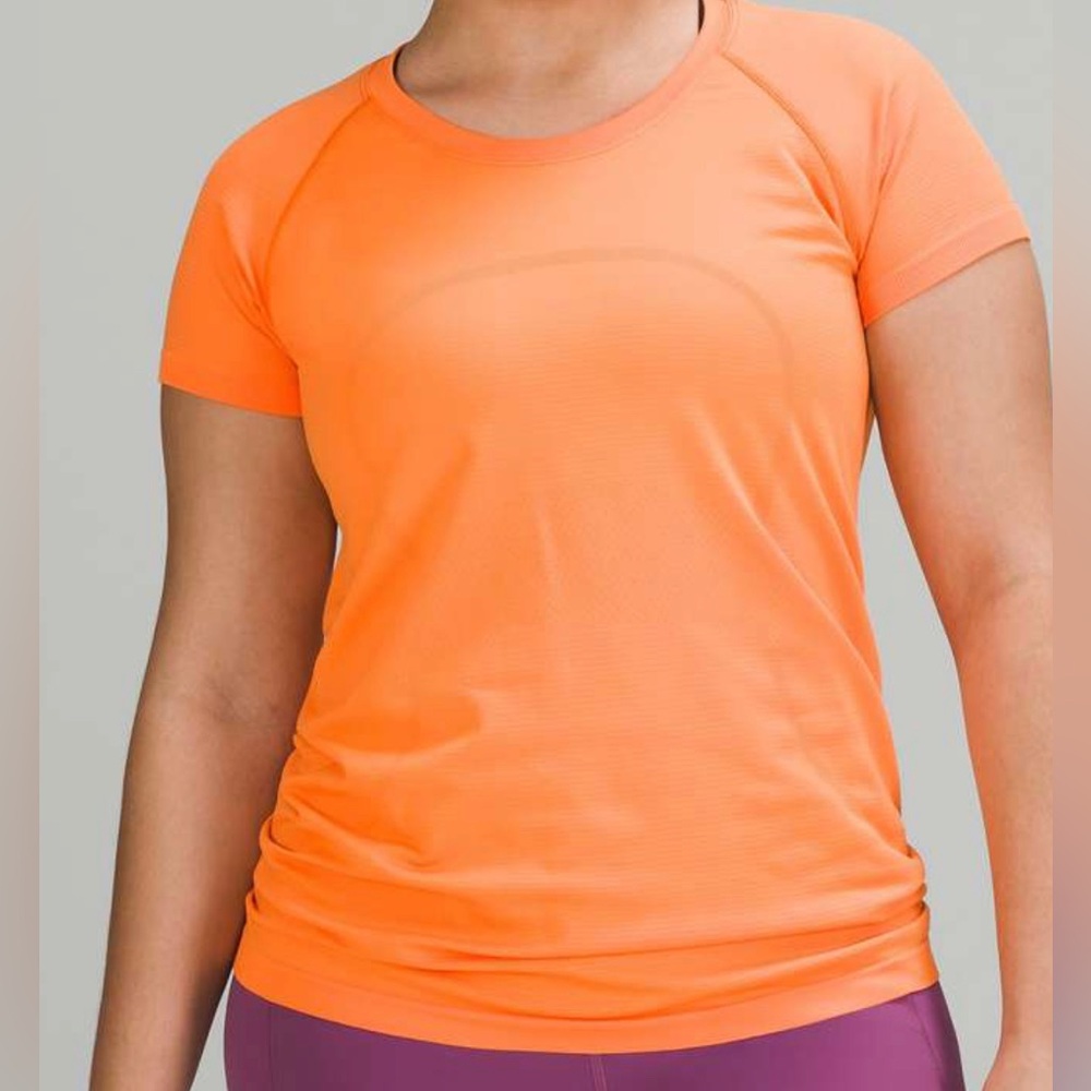 Orange lululemon swiftly tech size 12